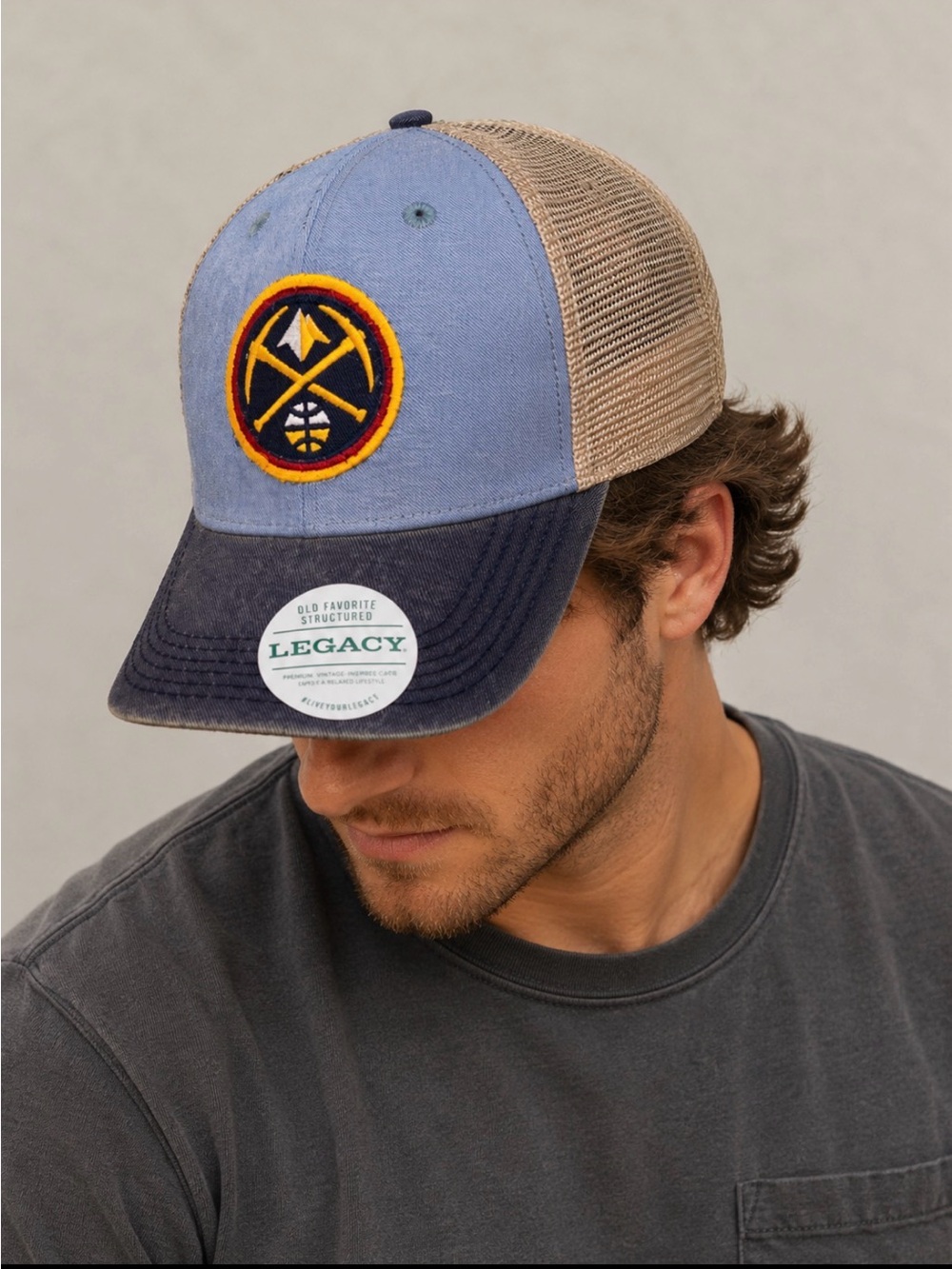 Denver Nuggets Legacy baseballtrucker hat featuring a structured gray/navy/blue